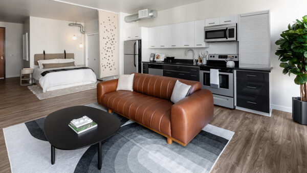 Griffis East Village Reno Model Living Room and Kitchen and Bedroom