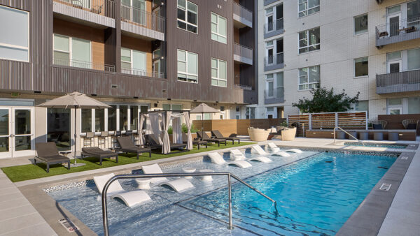 Apartment community pool with all-season spa at Griffis Cherry Creek North in Denver, Colorado.