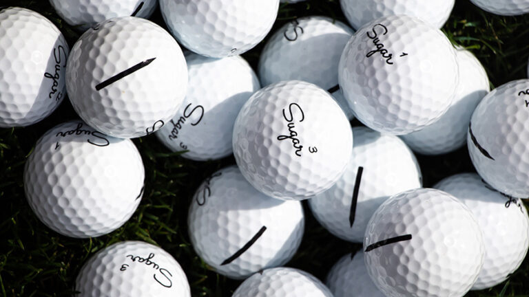 Pile of golf balls.