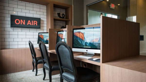 Apartment community business center with MAC work stations at Griffis Lakeline Station in Austin, Texas .