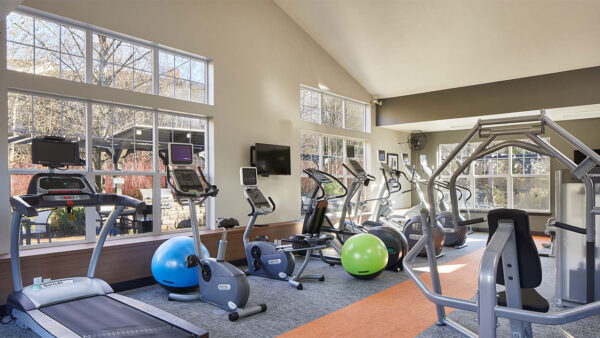 Apartment community 24-hour fitness center with Fitness on Demand™ at Griffis North Creek in Bothell, Washington.