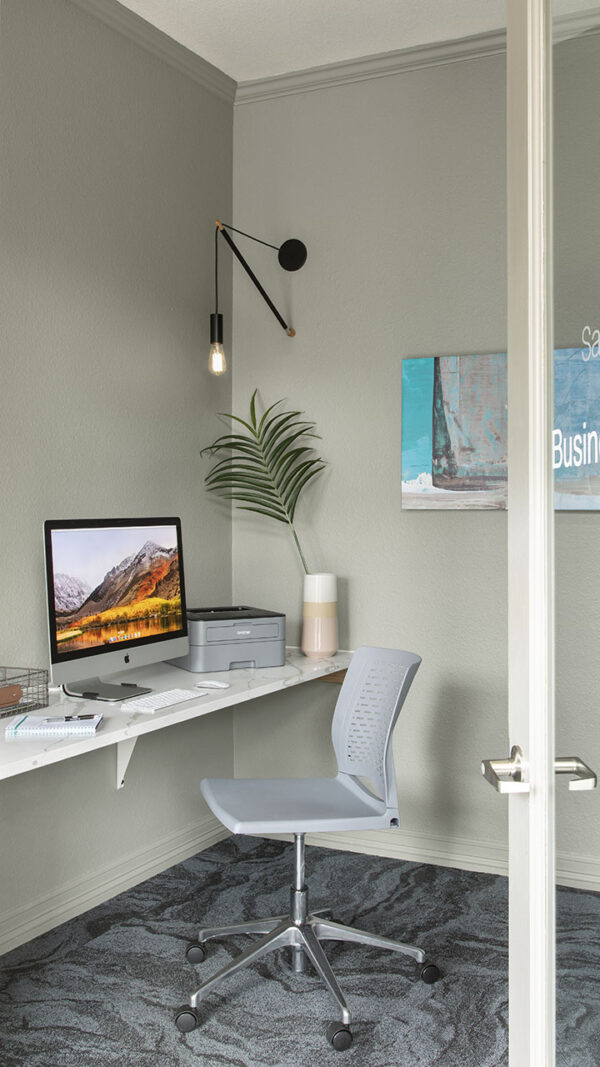 Apartment community business center with MAC work stations at Sagebrook in Colorado Springs, Colorado.
