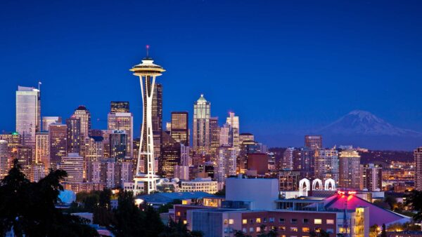 Seattle skyline with Space Needle and Mount Rainier.