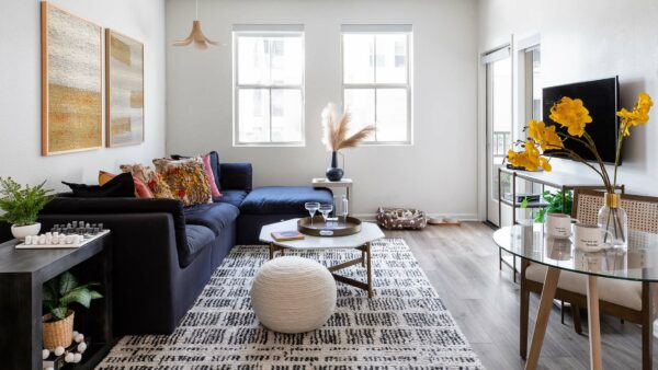 Apartment living room with wood-style flooring.