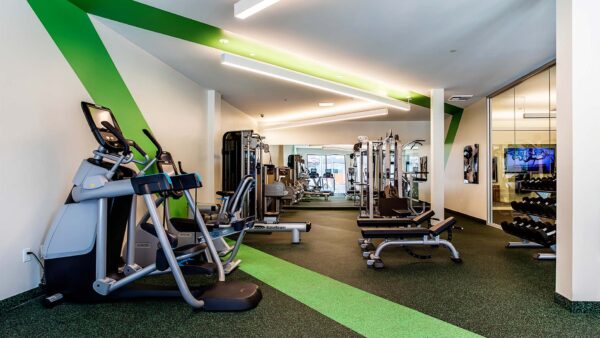 Apartment community 24-hour fitness center at Griffis Pine Ave in Long Beach, California.