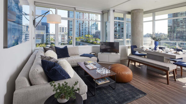 Apartment living room with wood-style flooring.