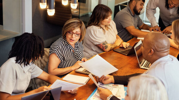 Griffis Residential associates collaborating in conference room.