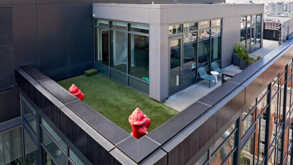 Apartment community dog run at Griffis Seattle Waterfront in Seattle, Washington.