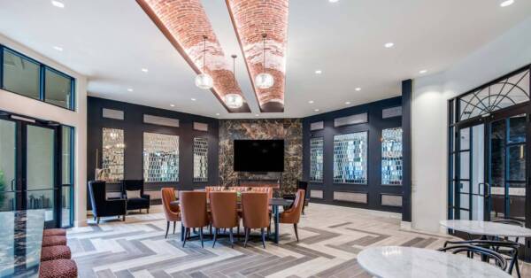 Griffis Frisco resident lounge with fireplace.