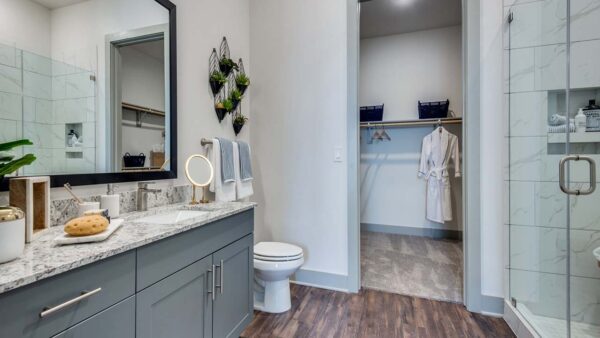 Griffis Frisco apartment bathroom with quartz countertops.