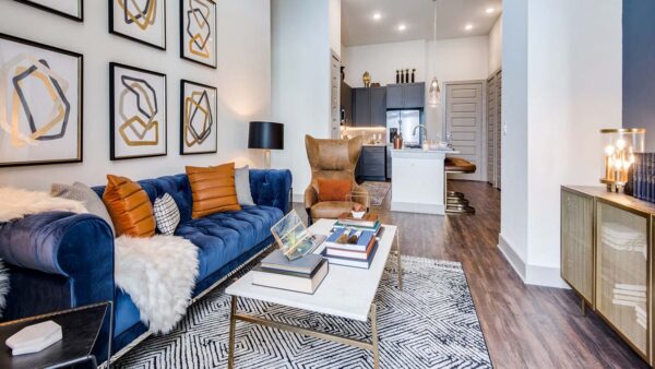Griffis Frisco apartment living room with wood style floor.