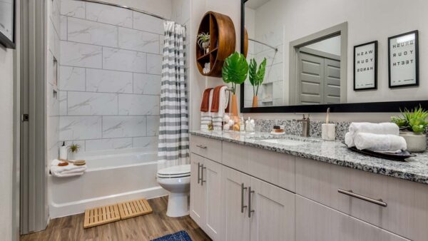 Griffis Frisco apartment bathroom with quartz countertops.