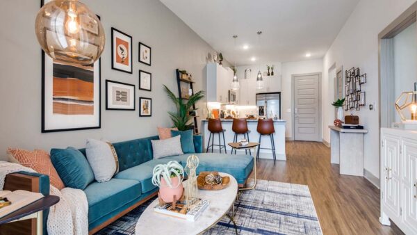 Griffis Frisco apartment living room with wood style floor.