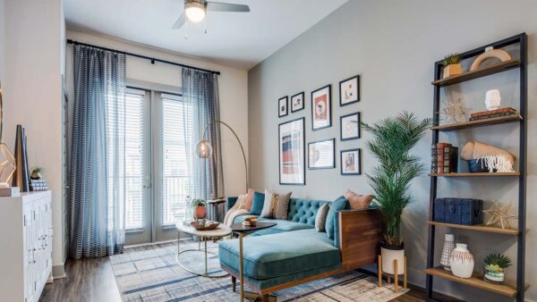 Griffis Frisco apartment living room with wood style floor.