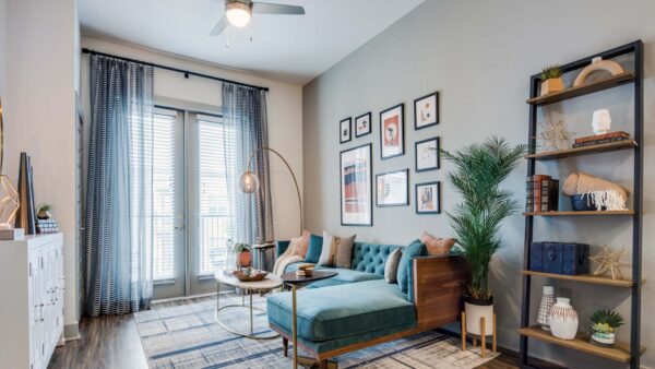 Griffis Frisco apartment living room with wood style floor.
