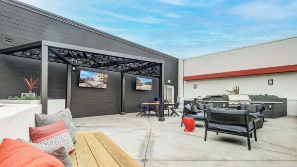 Griffis Platinum Triangle rooftop deck with TVs and BBQ grills.