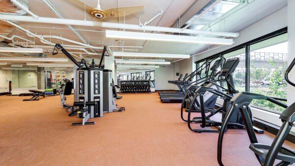 Griffis Shoreline fitness center with cardio machines and weight equipment.