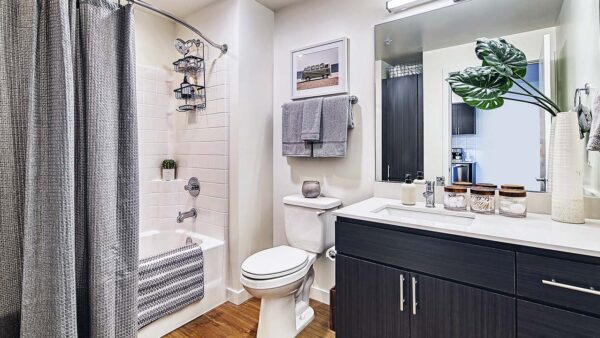 Griffis Shoreline apartment bathroom with quartz countertops.