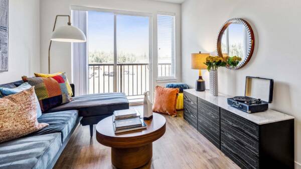 Griffis Shoreline apartment living room with wood style floor.