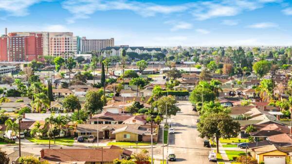 Anaheim downtown with blue skies and lush landscape.