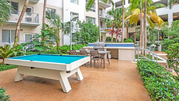 Outdoor Pool Table and Grill at Griffis North Olive