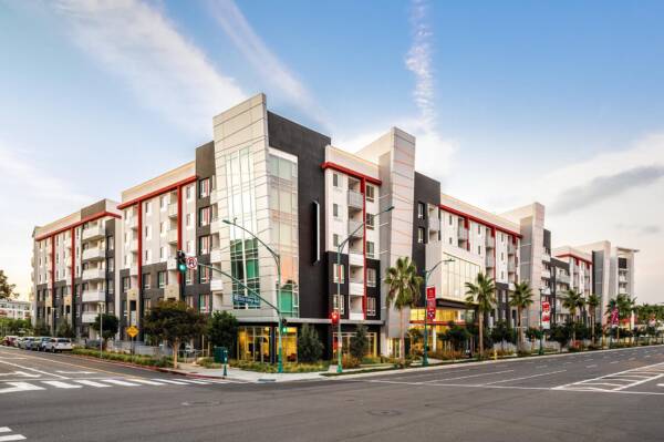 Griffis Platinum Triangle apartment building exterior at a street corner in Anaheim, California.