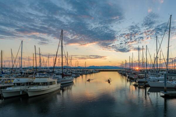 Marina with sailboats at sunset on Puget Sound.