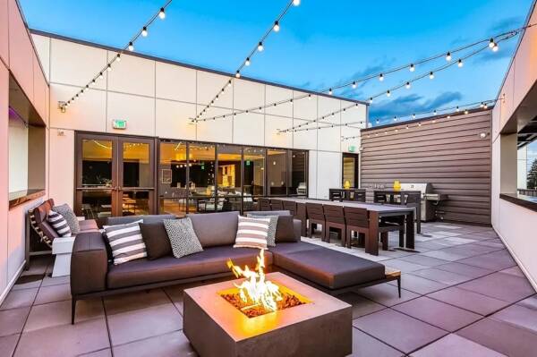 Griffis Shoreline rooftop deck with a fire pit and lounge seating.