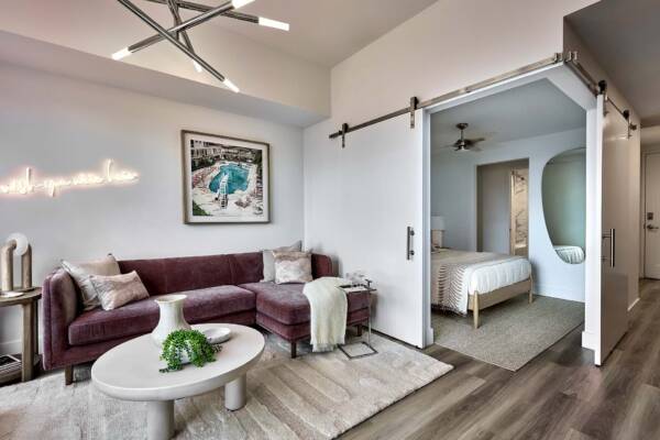 Griffis West Palm Beach apartment living area with wood style floor.