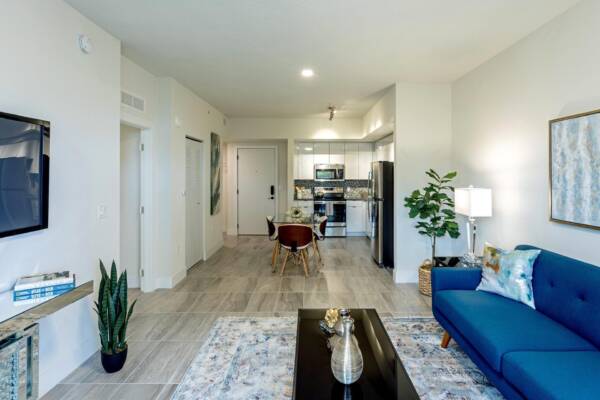Griffis Pomoano Beach Apartment Living Room with Tile Flooring