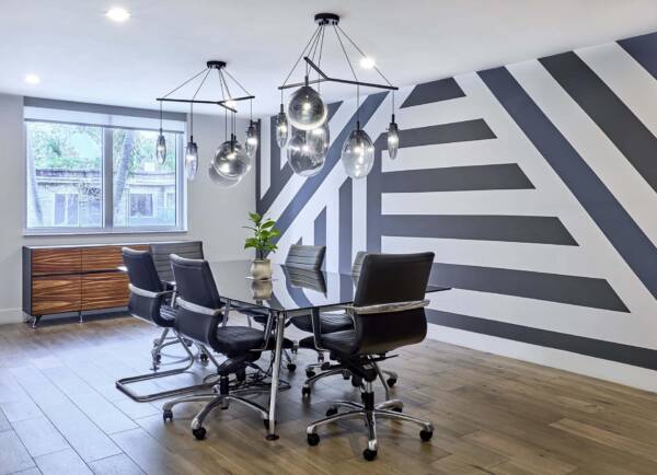 Conference room with table and chairs at Griffis Pompano Beach.