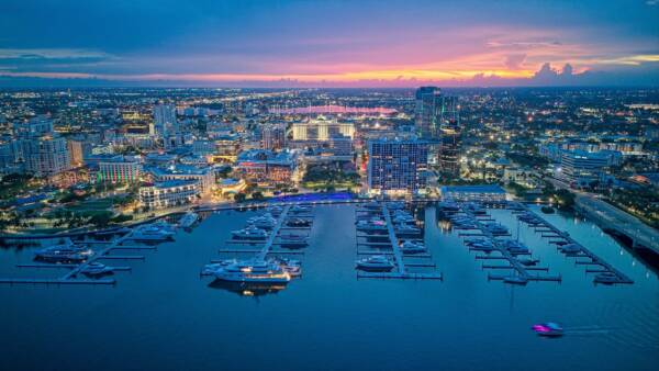 Aerial view of boats in West Palm Beach at dusk.
