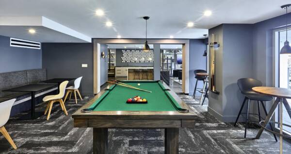 Resident lounge with pool table at Griffis Pompano Beach.