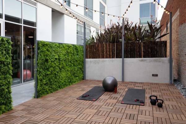 Griffis East Village apartment community outdoor fitness patio in San Diego, CA..