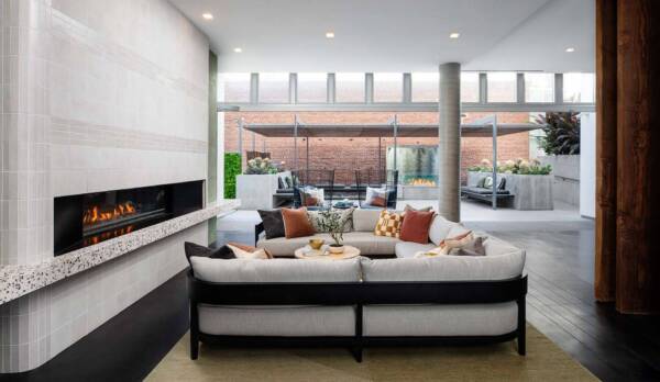 Griffis East Village apartment community resident lounge with fireplace in San Diego, CA.