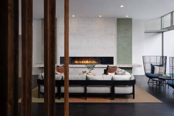 Griffis East Village apartment community resident lounge with fireplace in San Diego, CA.