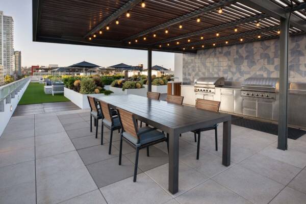 Griffis East Village apartment community rooftop kitchen and grilling station in San Diego, CA.