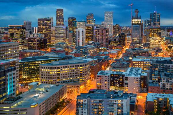 Denver skyline at night near Griffis LoDo.