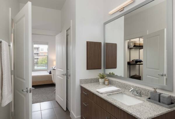 Griffis Oak Lawn apartment bathroom with tile floor.