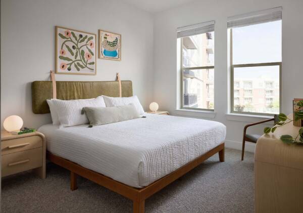 Griffis Oak Lawn apartment spacious bedroom with carpet.
