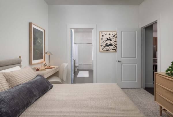 Griffis Oak Lawn apartment bedroom with carpet floor.