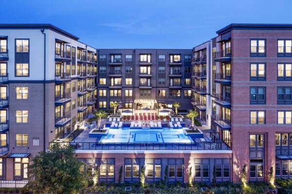 Griffis Oak Lawn apartment community exterior and pool in Dallas, TX.