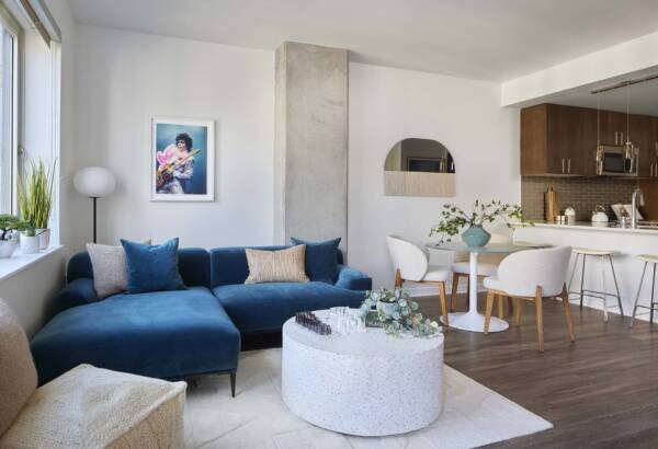Apartment living room with wood style floor.