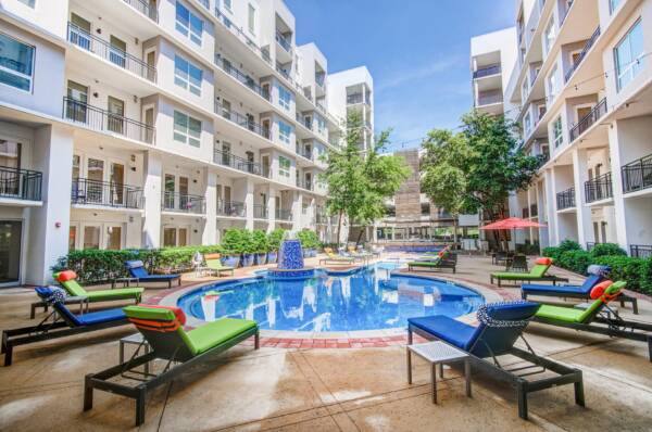 Apartment community pool at Griffis Uptown in Dallas, TX.